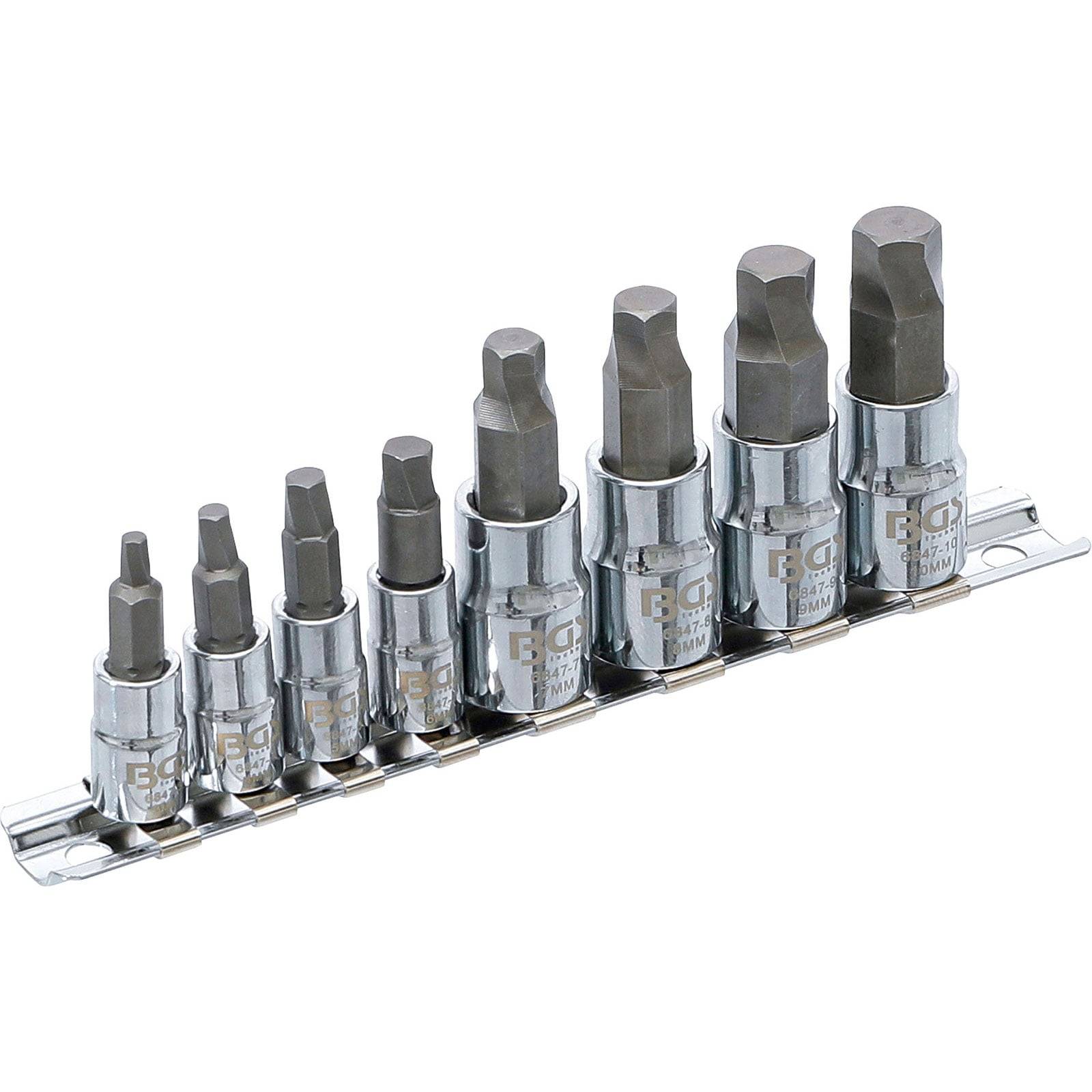 Ein Satz von acht Sechskant-Biteinsätzen in aufsteigender Größenordnung auf einer Metallschiene, verwendet zum Anziehen von Schrauben und Bolzen mit Sechskantaufnahmen.