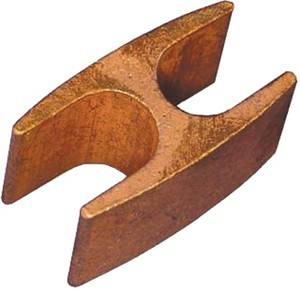 Ein bronzefarbenes, keilförmiges Objekt mit einer gebogenen Kerbe in der Mitte, das einem Schienenstück zum Verbinden zweier Eisenbahnschienen ähnelt.