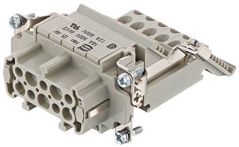 Ein beiger elektrischer Stecker mit mehreren Löchern und Schrauben, der für industrielle oder maschinelle Anwendungen verwendet wird.