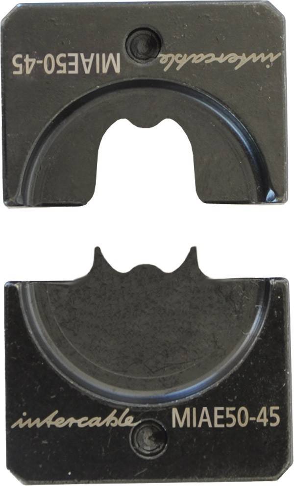 Eine Nahaufnahme eines dunklen Metallblocks mit einer U-förmigen Aussparung an einer Seite, die den Boden eines weiteren ähnlichen Blocks darüber zeigt.