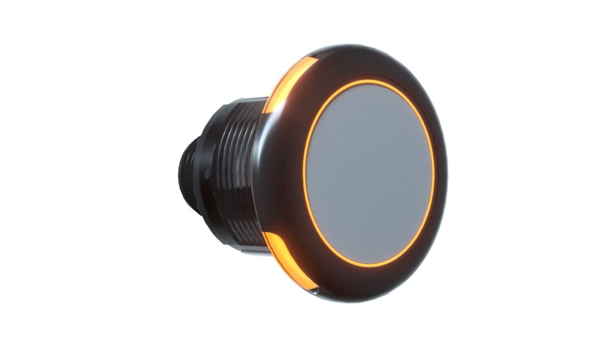 Ein runder schwarzer Knopf mit orangefarbenem Rand, der ein weiches Leuchten abstrahlt und häufig für Schnittstellensteuerungen oder elektronische Geräte verwendet wird.