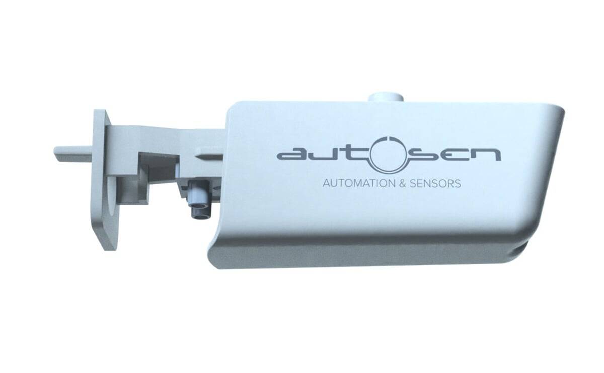 Eine mechanische Vorrichtung mit der Bezeichnung ‚Automation & Sensoren', die ein schlichtes industrielles Design aufweist und wahrscheinlich Teil eines Automatisierungssystems ist.