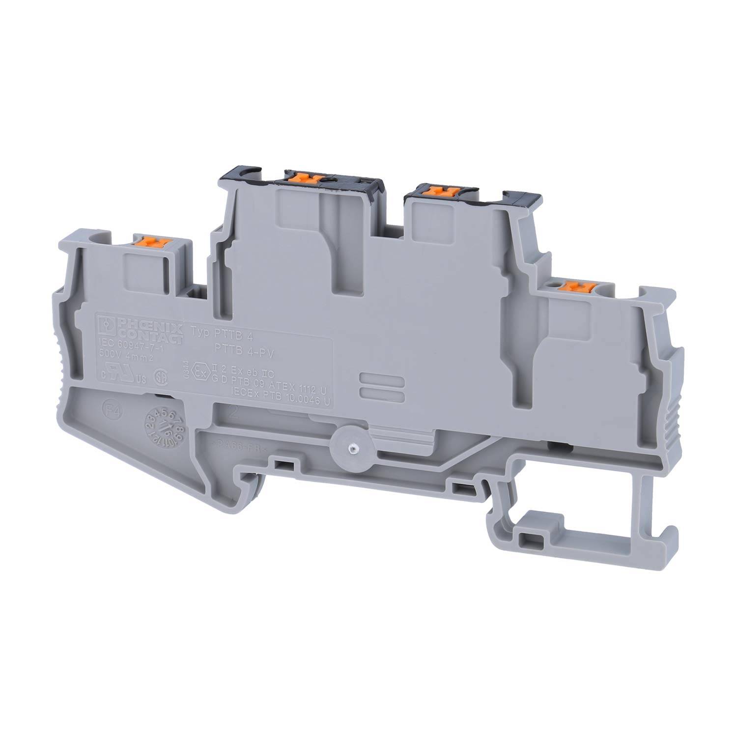 Ein graues elektrisches Klemmleistenblock mit orangen Anschlüssen, das zur Organisation und Verbindung von elektrischen Drähten in industriellen Umgebungen verwendet wird.