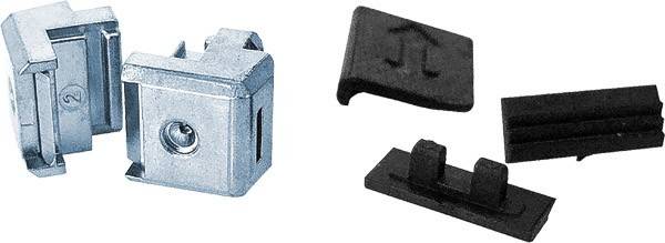 Eine Metall- und Kunststoffkomponente, möglicherweise ein Verbinder oder Befestigungselement, mit eckigem Design und Symbolen, die auf einem weißen Hintergrund dargestellt wird.