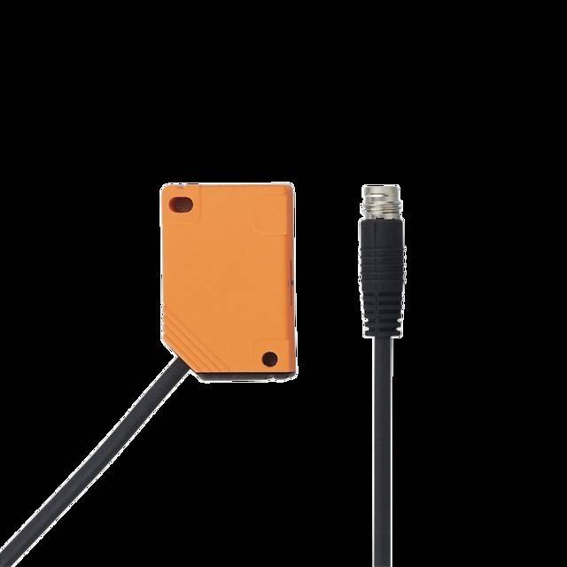 Ein orangefarbenes Quadratsensor mit einem schwarzen Kabel und Anschluss auf einem schwarzen Hintergrund, verwendet zur Erkennung von Umweltveränderungen.
