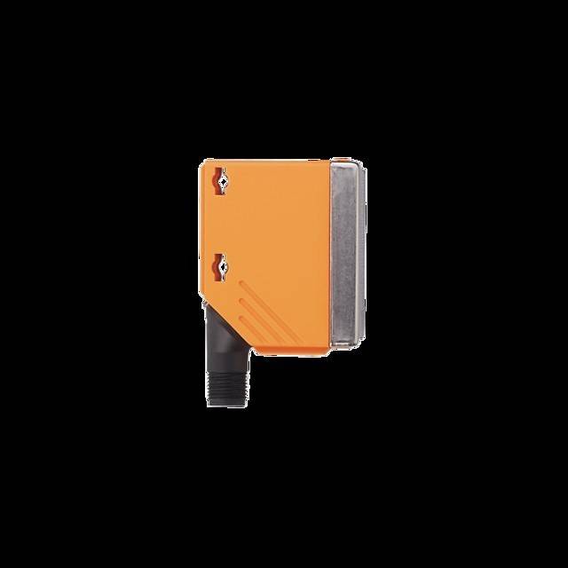 Ein orangefarbener industrieller Sensor mit einem schwarzen Kabel und einer metallischen Seite ist vor einem schwarzen Hintergrund positioniert.