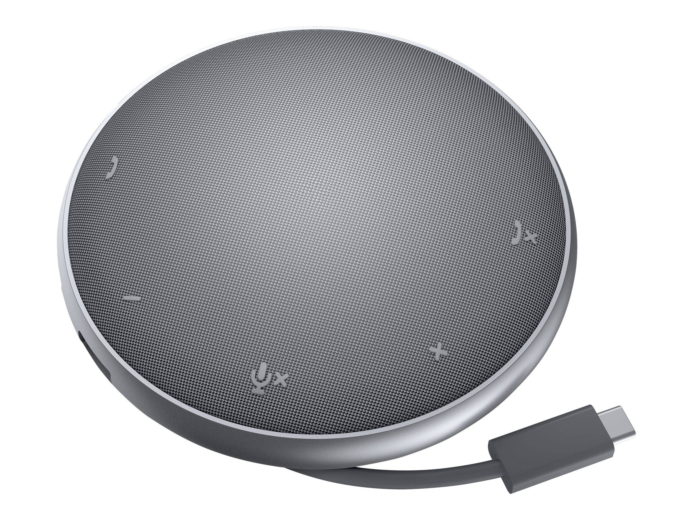 Tragbarer grauer Lautsprecher mit runder Form, vier Touch-Control-Symbolen auf der Oberseite und einem angeschlossenen USB-C-Ladekabel.