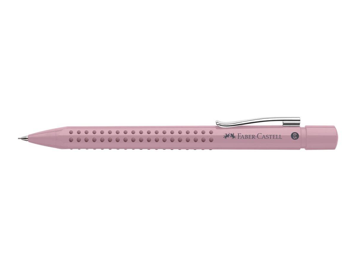 Rosa Faber-Castell-Stift oder Druckbleistift mit gepunkteter Griffzone und Clip, gezeigt auf weißem Hintergrund.