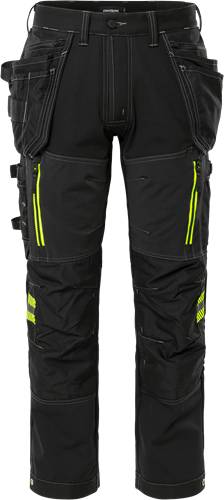 Schwarze taktische Hose mit neongelben Reißverschlüssen und Taschen, entwickelt für Outdoor-Aktivitäten und Utility-Aufgaben.