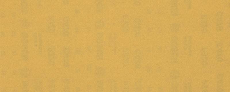 Eine schlichte, strukturierte senfgelbe Oberfläche.