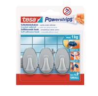 Packung tesa Powerstrips Klebehaken, zeigt drei graue Haken an einer gefliesten Wand; mit Etikett max. 1 kg und einfach anzubringen/zu entfernen.