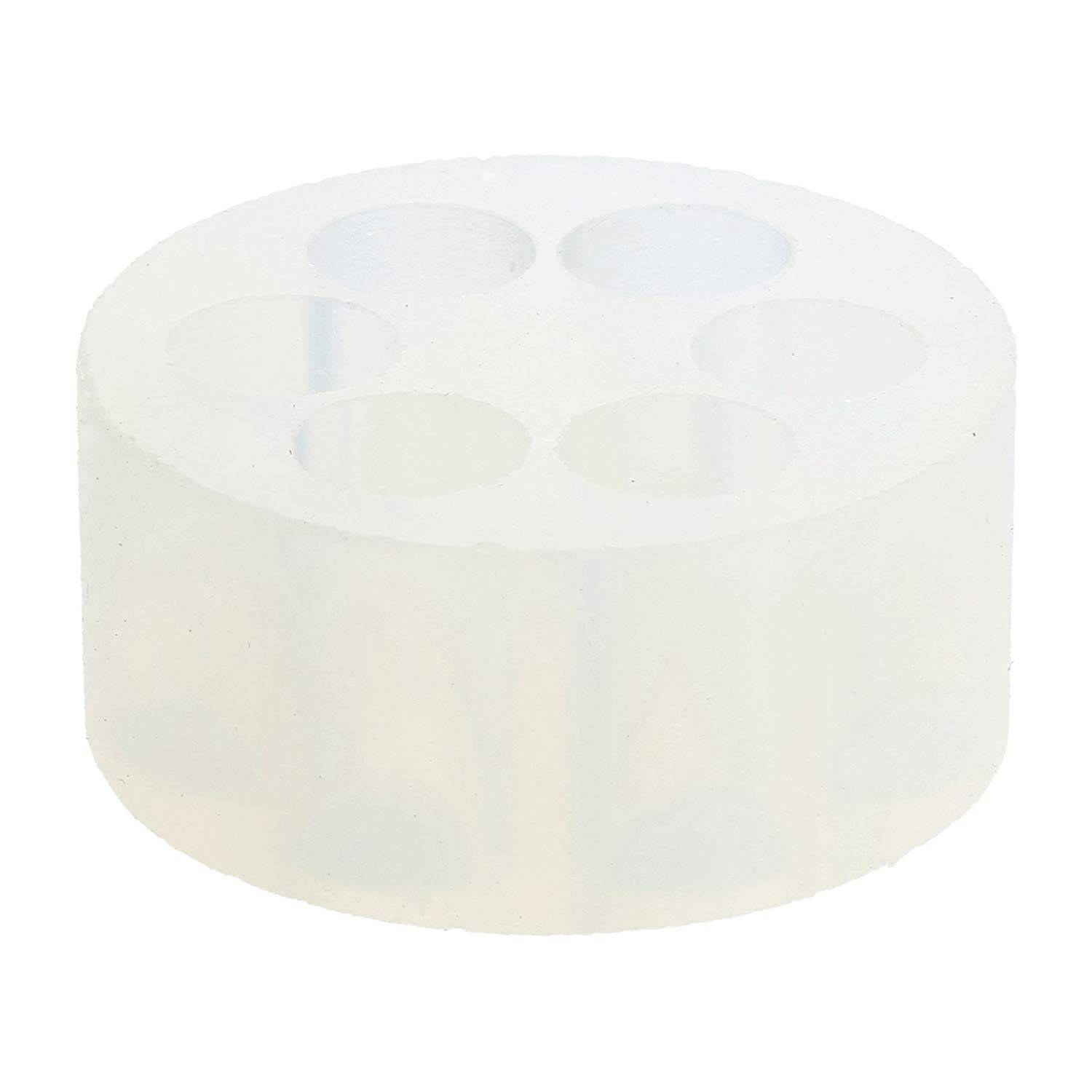 Transparenter Silikonzylinder mit fünf kreisförmigen Löchern, der als Cake-Pop-Ständer verwendet wird und es ermöglicht, dass Kuchen aufrecht zum Verzieren stehen.