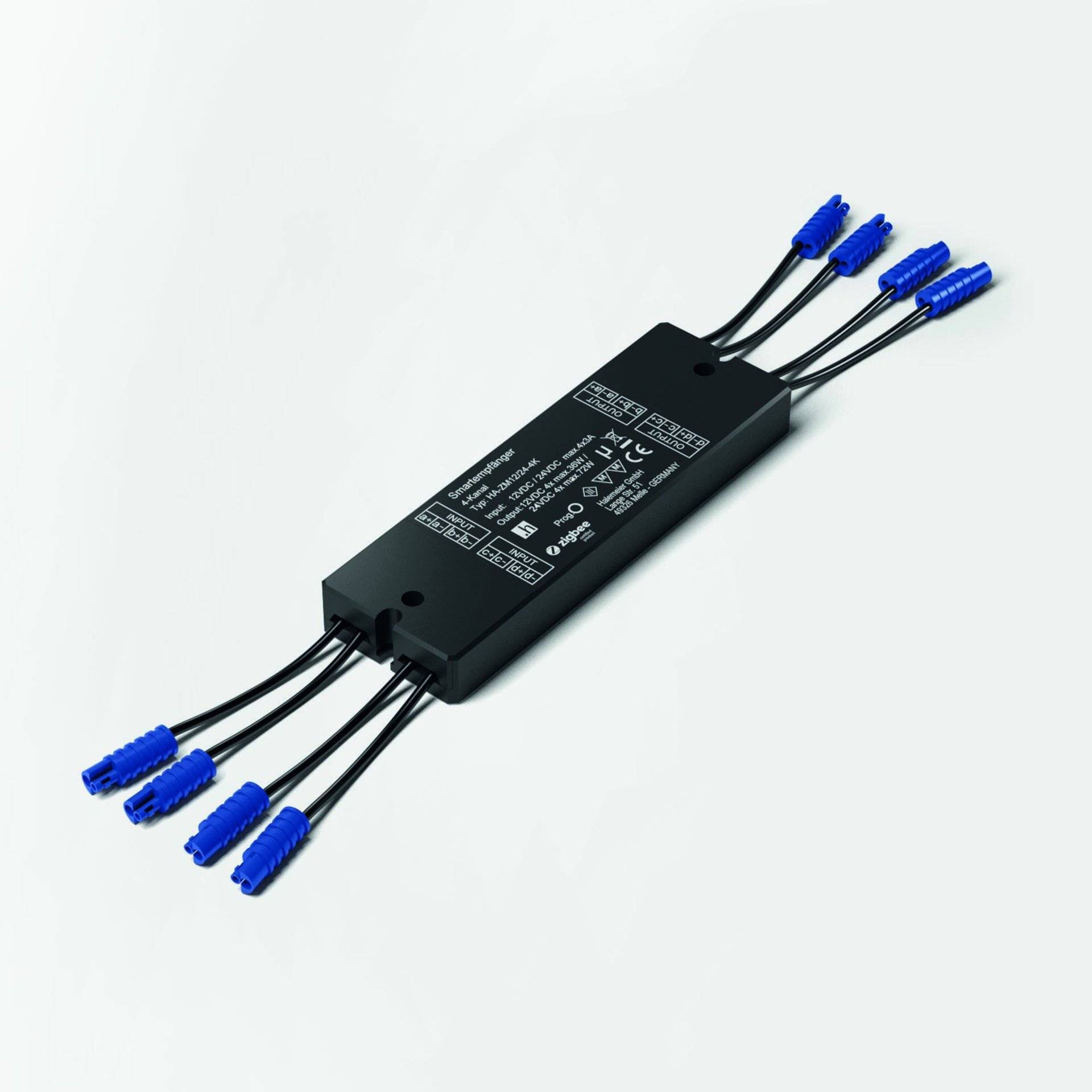 Rechteckiges elektronisches Gerät mit mehreren blauen Steckverbindern, wahrscheinlich ein Modul oder Regler, das in technischen oder elektrischen Anwendungen verwendet wird.