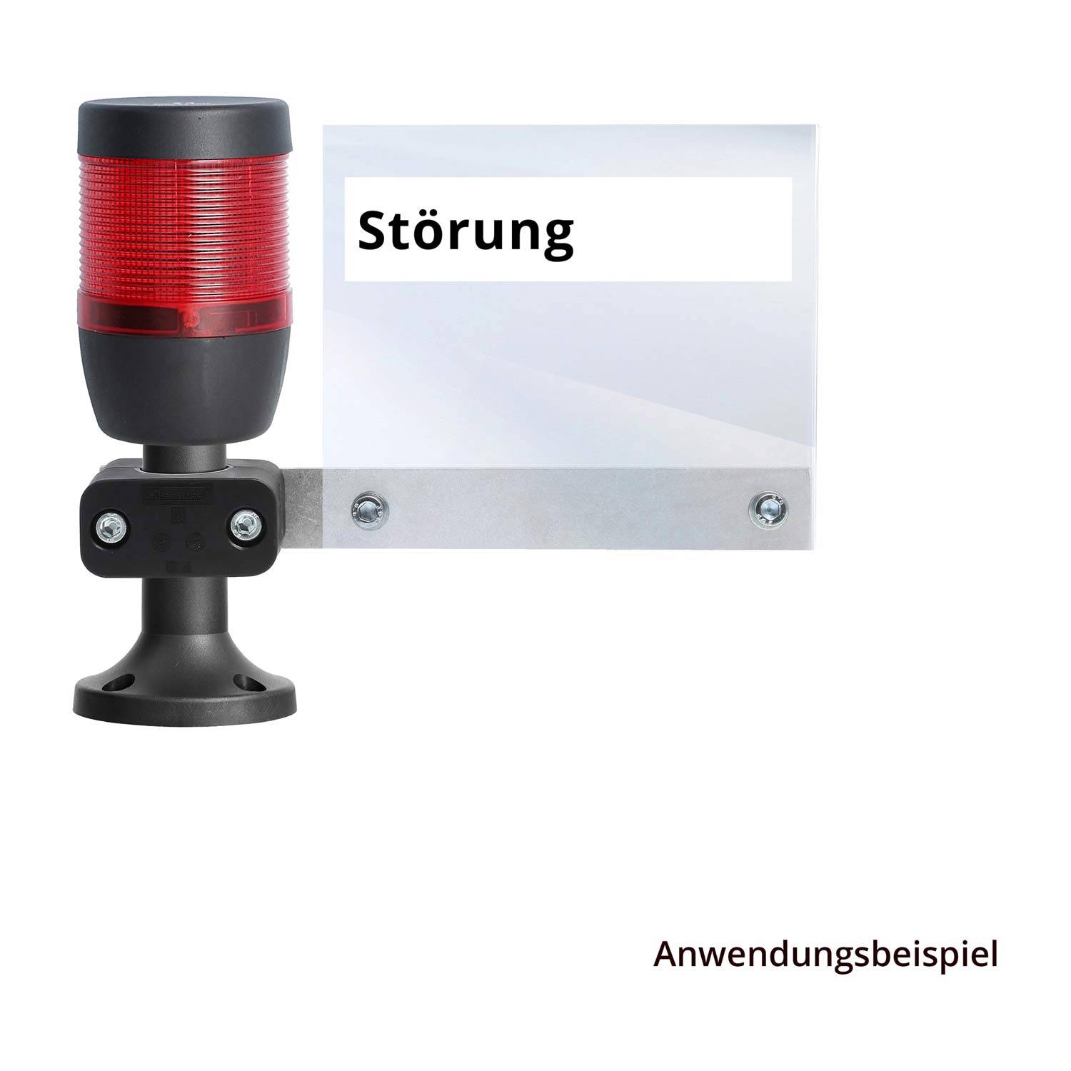 Ein Signallicht mit einer roten Linse, montiert auf einem Ständer. Ein Schild daneben trägt die Aufschrift 
