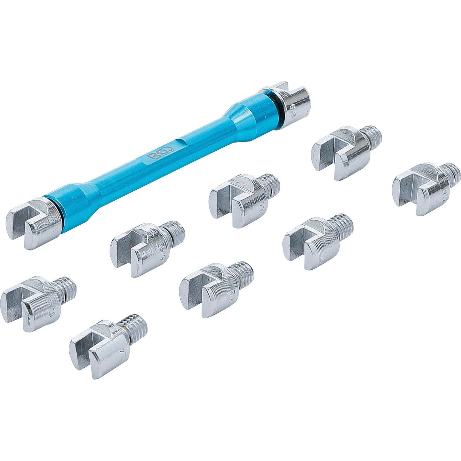 Ein Drehmomentschlüssel mit acht auswechselbaren Köpfen, in zwei Reihen angeordnet. Der Schlüssel verfügt über einen blauen Griff und silberne Metallköpfe.