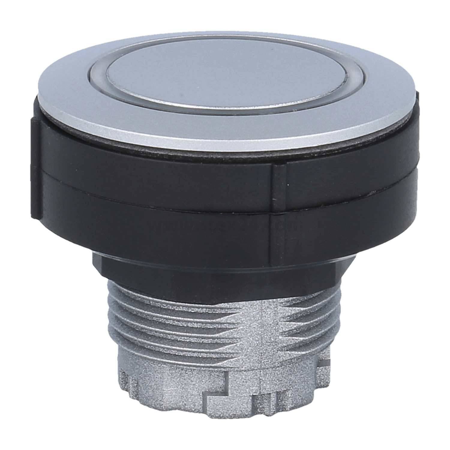 „Eine runde, metallische Drucktaste mit silberner Oberseite und schwarzem Ring, montiert auf einer Gewindelinie, wird in industriellen Steuerungssystemen verwendet.