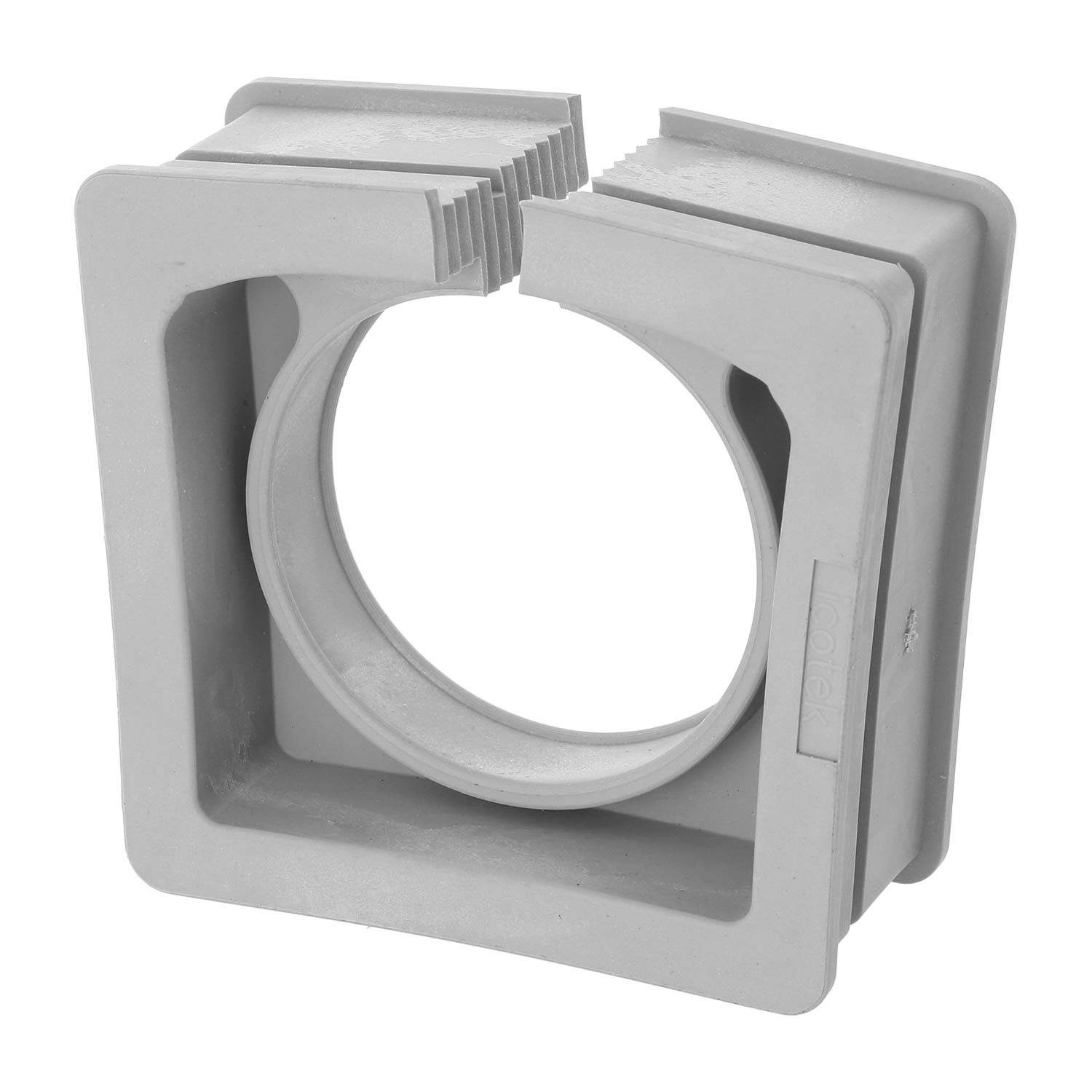Eine graue, rechteckige Kunststoffhalterung mit einer kreisförmigen Aussparung in der Mitte und gezahnten Kanten oben.