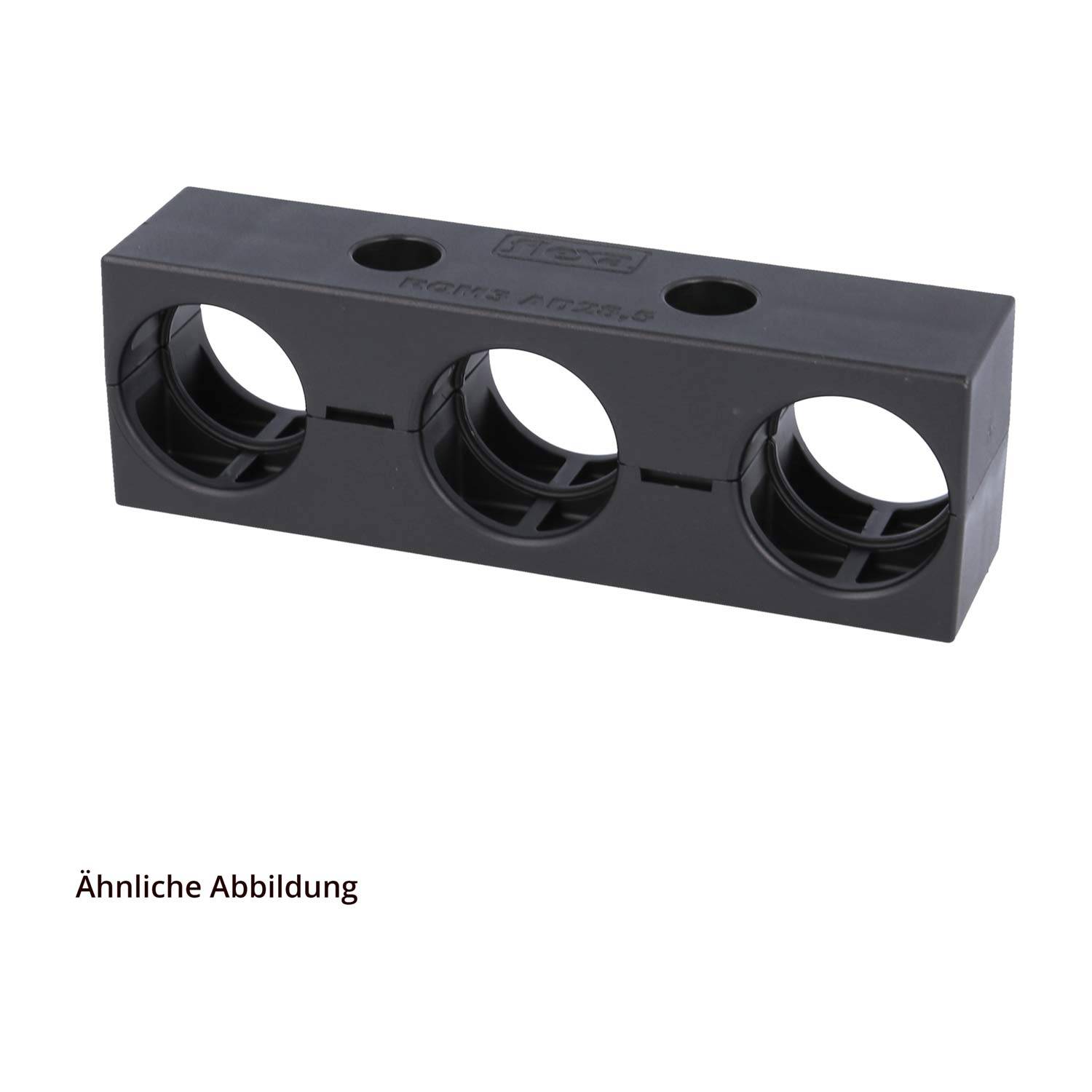 Ein schwarzer rechteckiger Kunststoffblock mit drei kreisförmigen Löchern in einer Reihe.