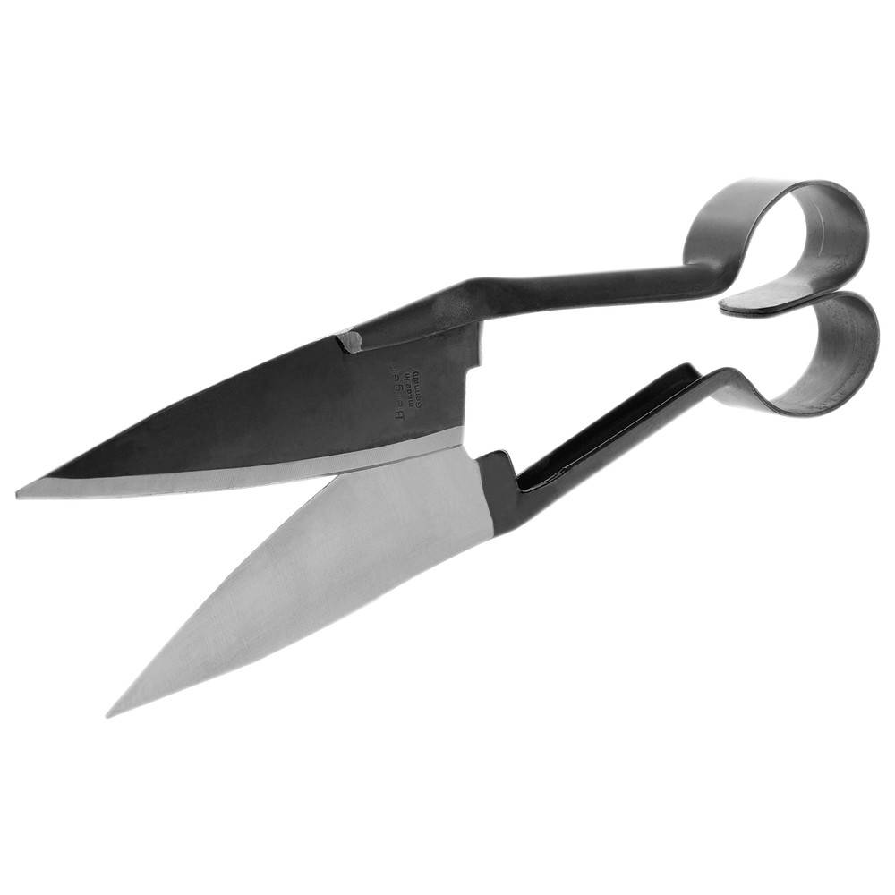 Altmodische Schafscheren mit Schlaufengriff und zwei scharfen Klingen, die zum Scheren von Wolle verwendet werden.