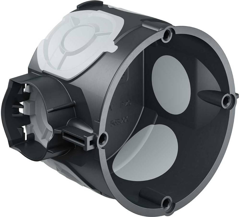 Eine runde, graue elektrische Abzweigdose mit hohlen Fächern und Schraublöchern, konzipiert für die Verbindung mehrerer elektrischer Leitungen.