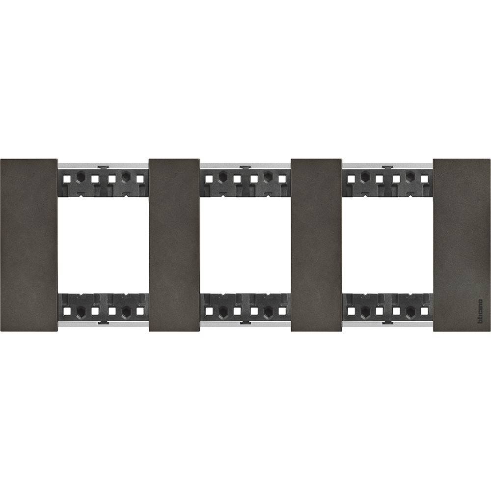 Ein fünffacher modularer Schalterrahmen mit dunklen Abdeckungen, der mehrere Schaltereinheiten aufnimmt und für die Wandmontage konzipiert ist.