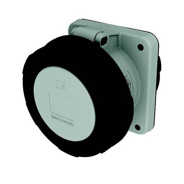 Made in Germany' markiertes kreisförmiges Gerät, höchstwahrscheinlich eine Steckdose oder ein Stecker, mit einer Abdeckung und einer Montagebasis.