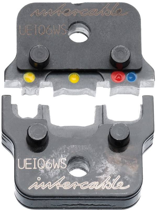 Eine Nahaufnahme eines mechanischen Werkzeugs mit farbigen Indikatoren: Gelbe, grüne, blaue und rote Punkte sind sichtbar, die wahrscheinlich verschiedene Einstellungen anzeigen.