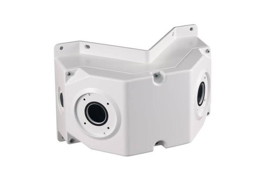 Weiße industrielle mechanische Gehäuse- oder Getriebekasten mit mehreren kreisförmigen Anschlüssen, isoliert auf einfachem weißem Hintergrund dargestellt.