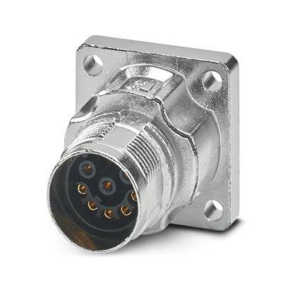 Ein Metallstecker mit sechs runden Eingängen in kreisförmiger Anordnung, montiert auf einer quadratischen Basis mit vier Schraubenlöchern.