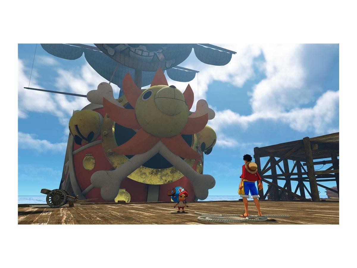 Ein großes Schiff mit einem lächelnden Löwenkopf am Bug ist am Dock vertäut. Zwei Zeichentrickfiguren, eine davon mit einem Strohhut, stehen auf dem Holzsteg unter einem sonnigen Himmel.