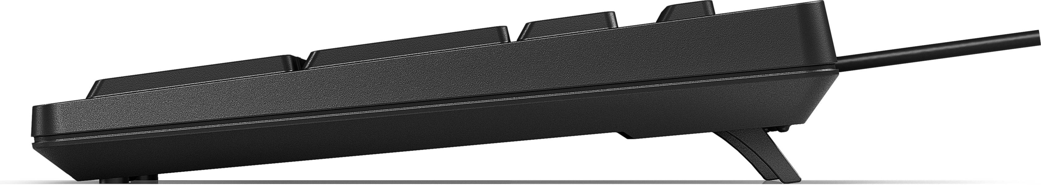 Schwarze, flache Computertastatur von der Seite auf weißem Hintergrund gezeigt, die ihr dünnes keilförmiges Design und das angeschlossene Kabel hervorhebt.