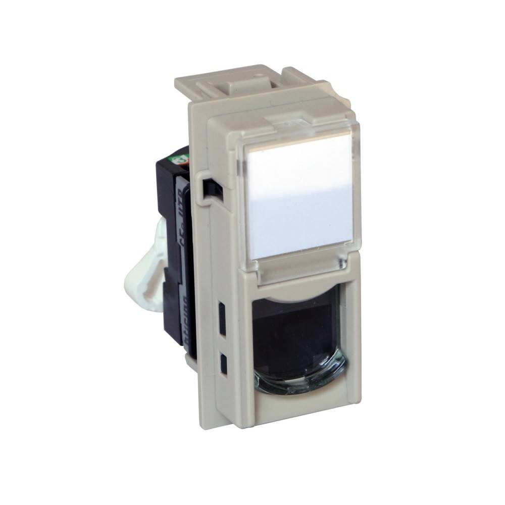 Eine beige elektrische Komponente mit einem weißen Rechteck auf der Oberseite und einer schwarzen Öffnung am unteren Ende, möglicherweise ein Schalter oder Sensor.