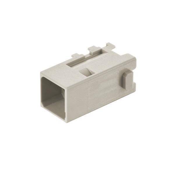 Ein rechteckiges, beiges Kunststoffverbindergehäuse mit Aussparungen und einem offenen Ende, das für elektronische Geräteverbindungen konzipiert ist.