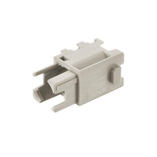 Ein beige-farbiger Kunststoff-Verbindungskomponent mit rechteckiger Form und offenen Schlitzen, der in elektronischen Baugruppen zur Sicherung von Verbindungen verwendet wird.