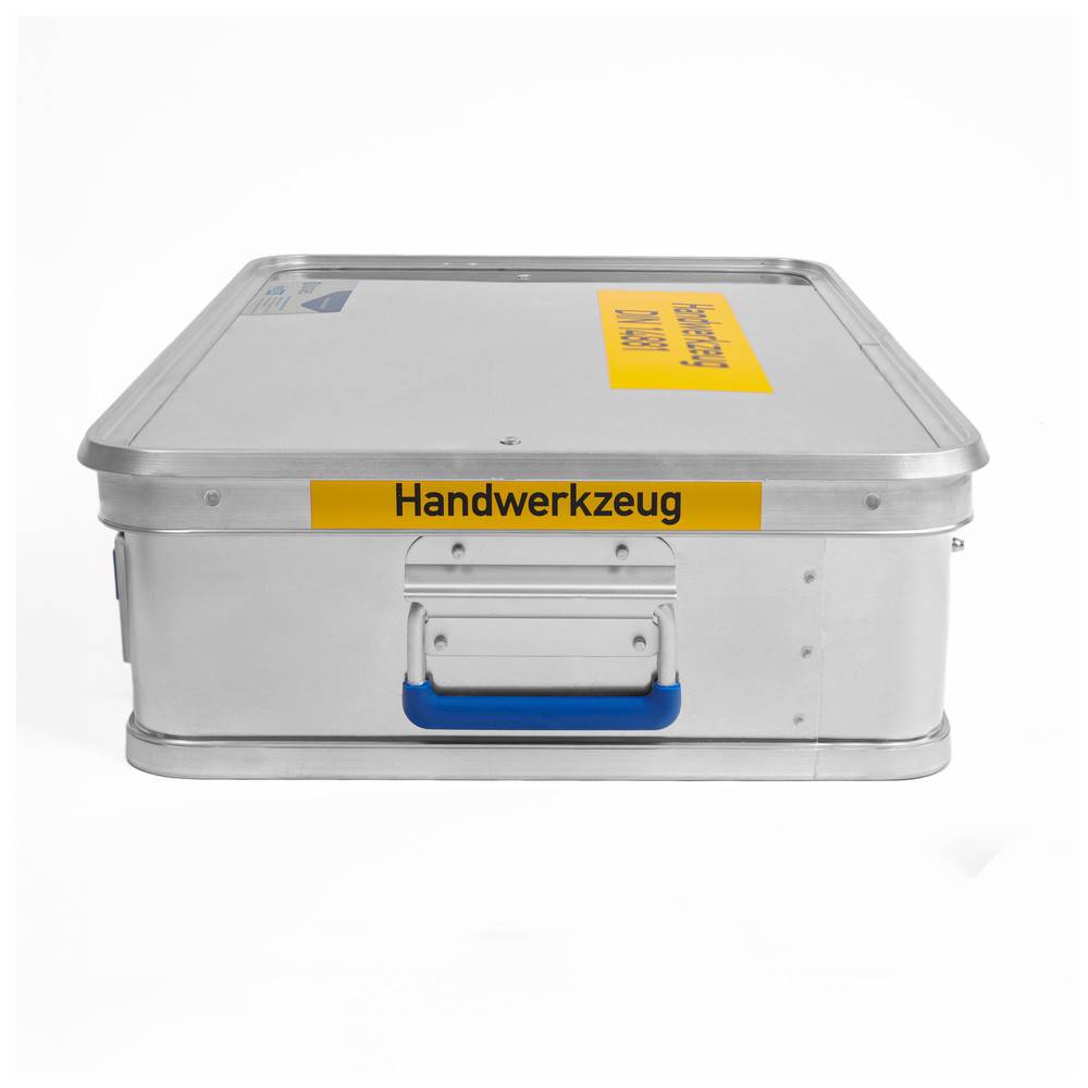 Eine silberne Metalldose mit einem blauen Griff und einem gelben Etikett mit der Aufschrift 