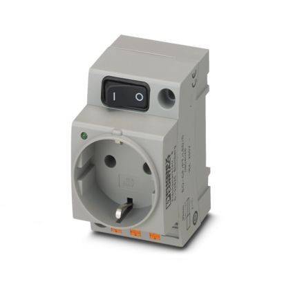 Ein graues Elektrosteckdosenmodul mit einem schwarzen Ein-/Ausschalter oben. Es hat eine kreisförmige Steckdose vorne und verschiedene Stecker an den Seiten.