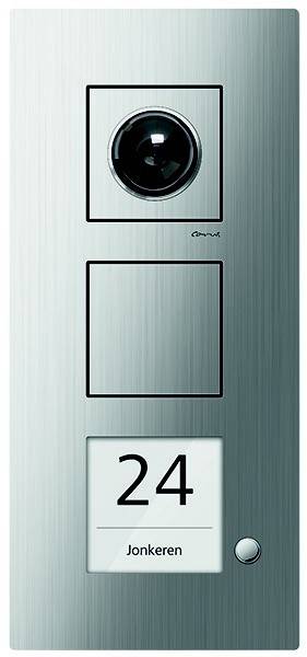 Ein Metallpanel mit einer kreisförmigen Taste oben, einem großen rechteckigen Bereich in der Mitte und einer digitalen Anzeige, die unten die Zahl '24' zeigt.