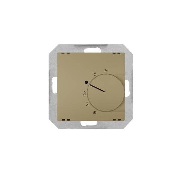 Ein beiger Drehschalter-Thermostat, der auf 5 eingestellt ist, mit Einstellungen von 0 bis 6, an einer Metallhalterung montiert.
