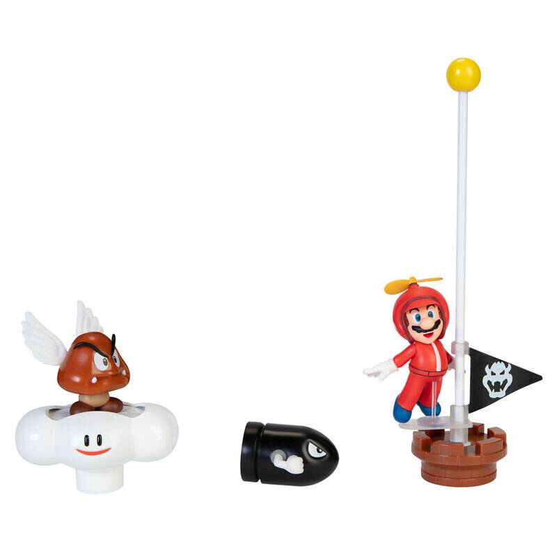 Spielzeugfiguren einer Figur in einem roten Outfit, die neben einem Fahnenmast springt, eines geflügelten Wesens auf einer Wolke und einer schwarzen Rakete.