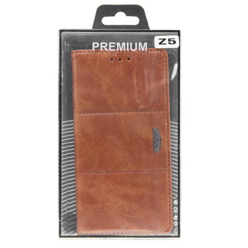 Lederhandyhülle in Einzelhandelverpackung mit dem Etikett „Premium Z5