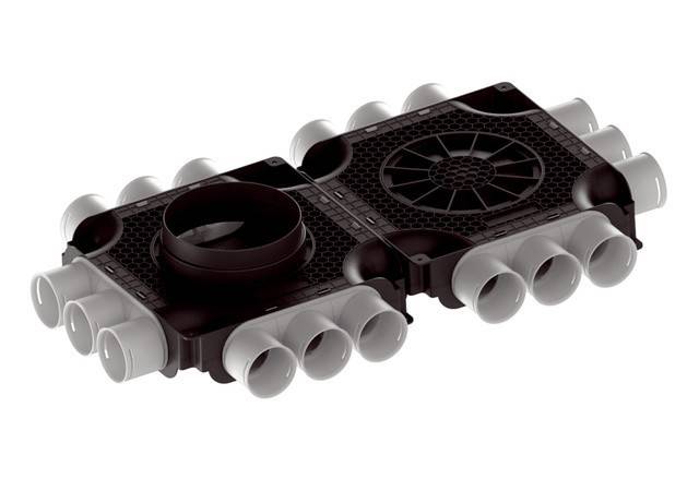 Eine Verteilerdose mit mehreren kreisförmigen Anschlüssen zur Luftströmungsverteilung in Belüftungssystemen.