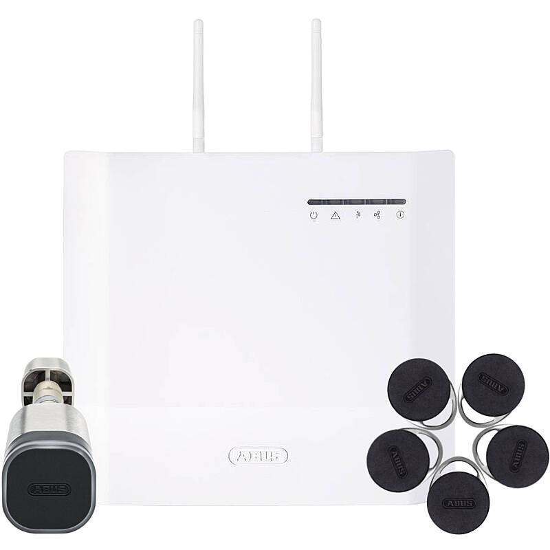 Ein weißer Smart-Home-Sicherheitssystem-Hub mit Antennen, gekoppelt mit einem Schließzylinder und sechs schwarzen Schlüsselanhängern mit der Bezeichnung 'ABUS'.