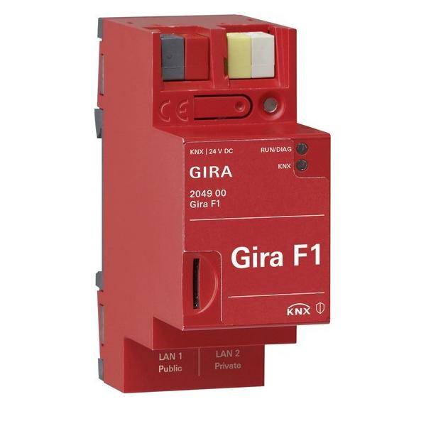 Ein roter Gira F1 Steuermodul mit Anschlüssen für LAN-Verbindungen, beschriftet mit 'Public' und 'Private', der zur Integration von Heimautomatisierungsnetzwerken verwendet wird.