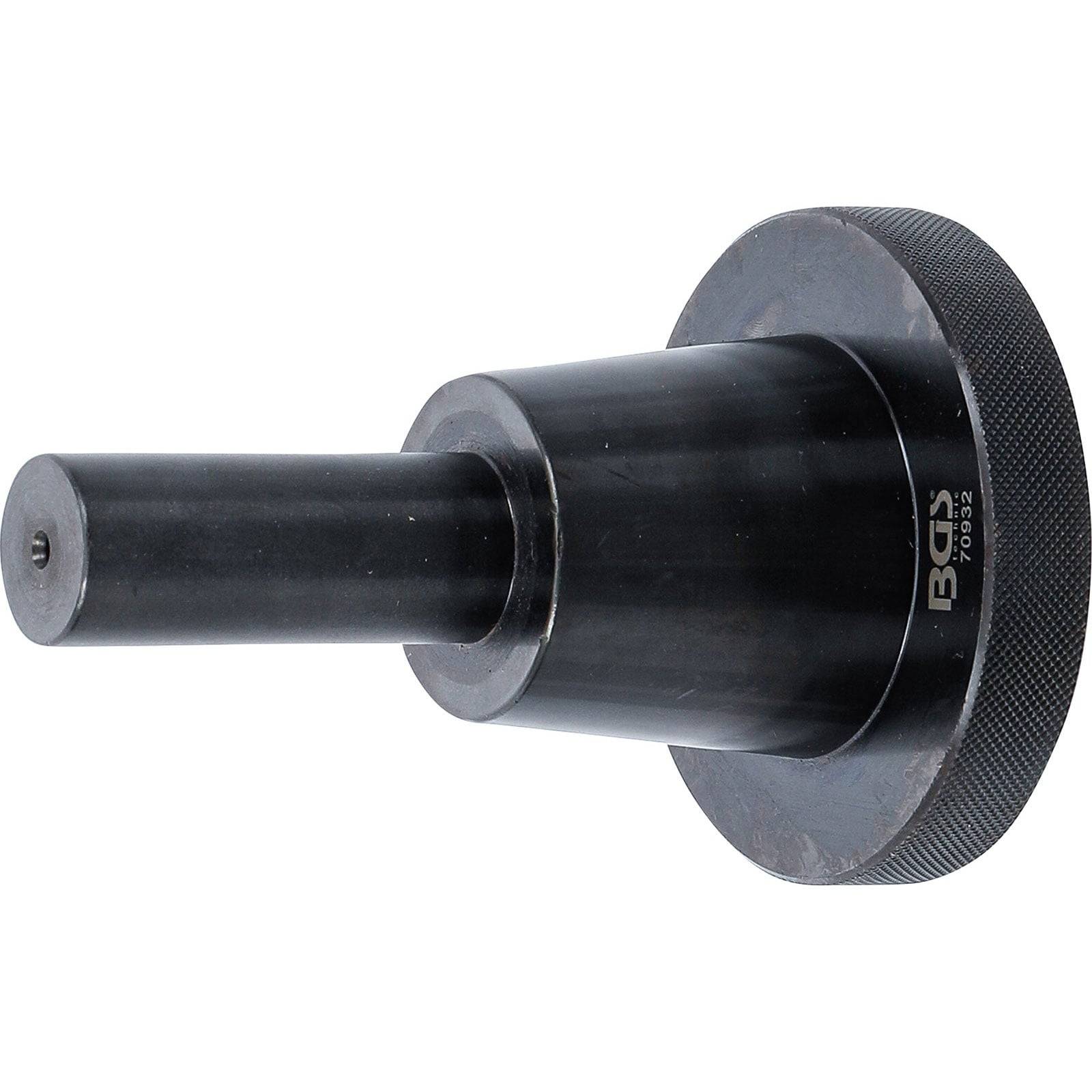 Ein zylindrischer schwarzer Metalleinsatz mit einer breiten Basis und einem schmaleren Schaft, möglicherweise für industrielle Zwecke oder Maschinen verwendet.