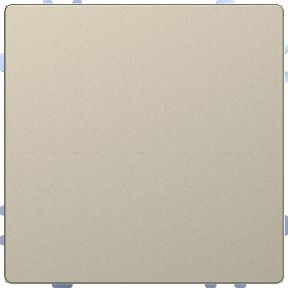 Ein beige Lichtschalterblende mit abgerundeten Ecken, montiert an einer weißen Wand mit blassen blauen Polkapunkten.