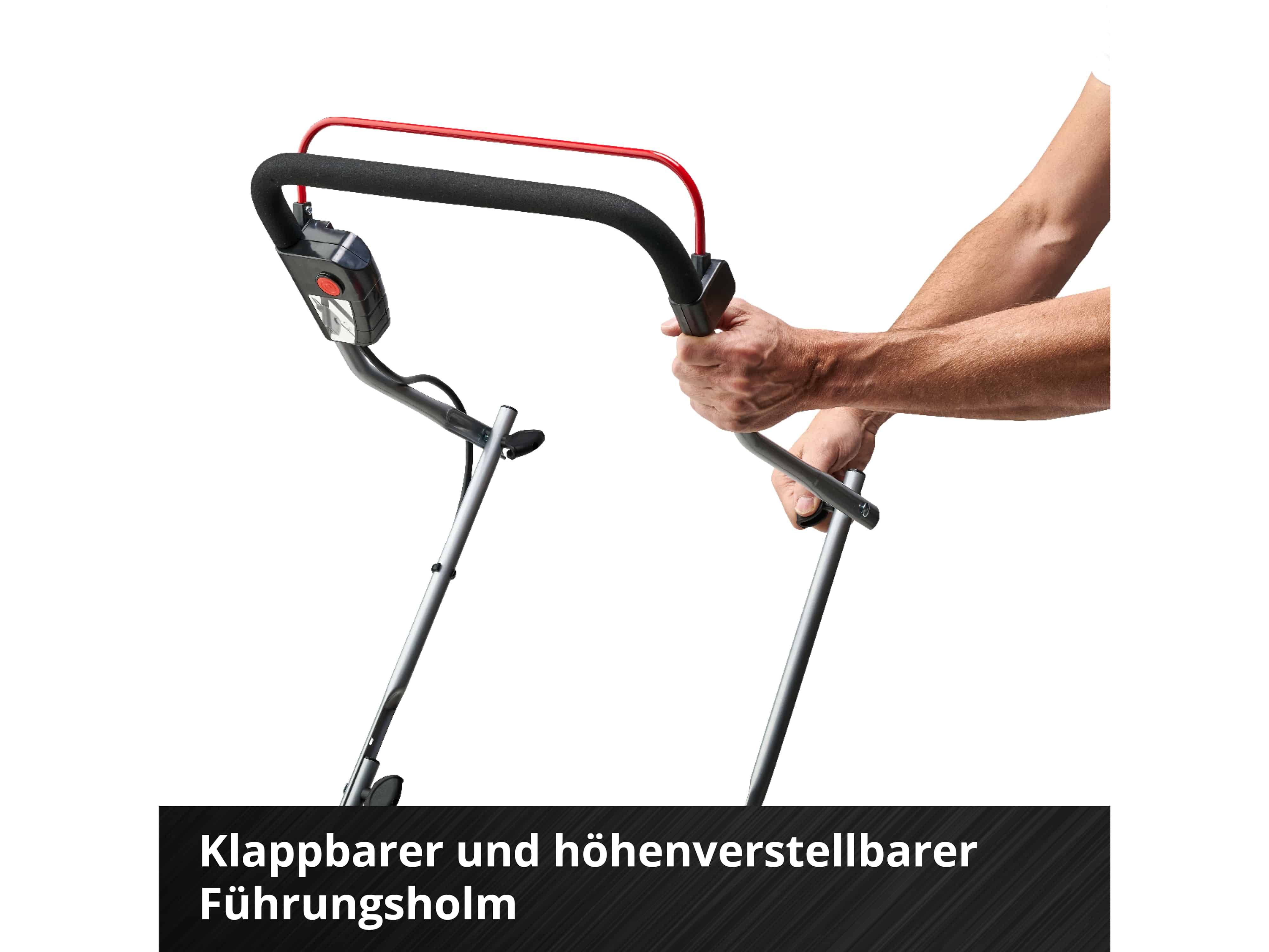 Der Arm einer Person, die einen klappbaren und höhenverstellbaren Führungsholm einer Maschine hält. Text: 'Klappbarer und höhenverstellbarer Führungsholm'.
