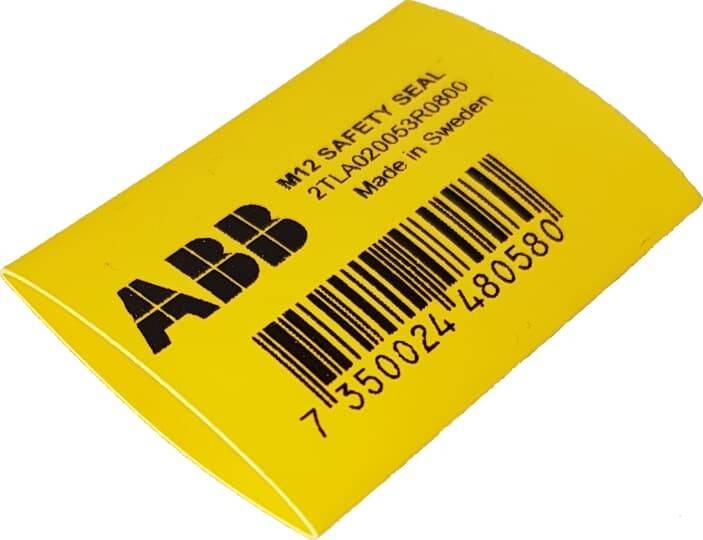 Gelbes Etikett mit 'ABB' Logo, Barcode und Text 'M12 SICHERHEITSSIEGEL, 2TLA020053R0600, Hergestellt in Schweden'.