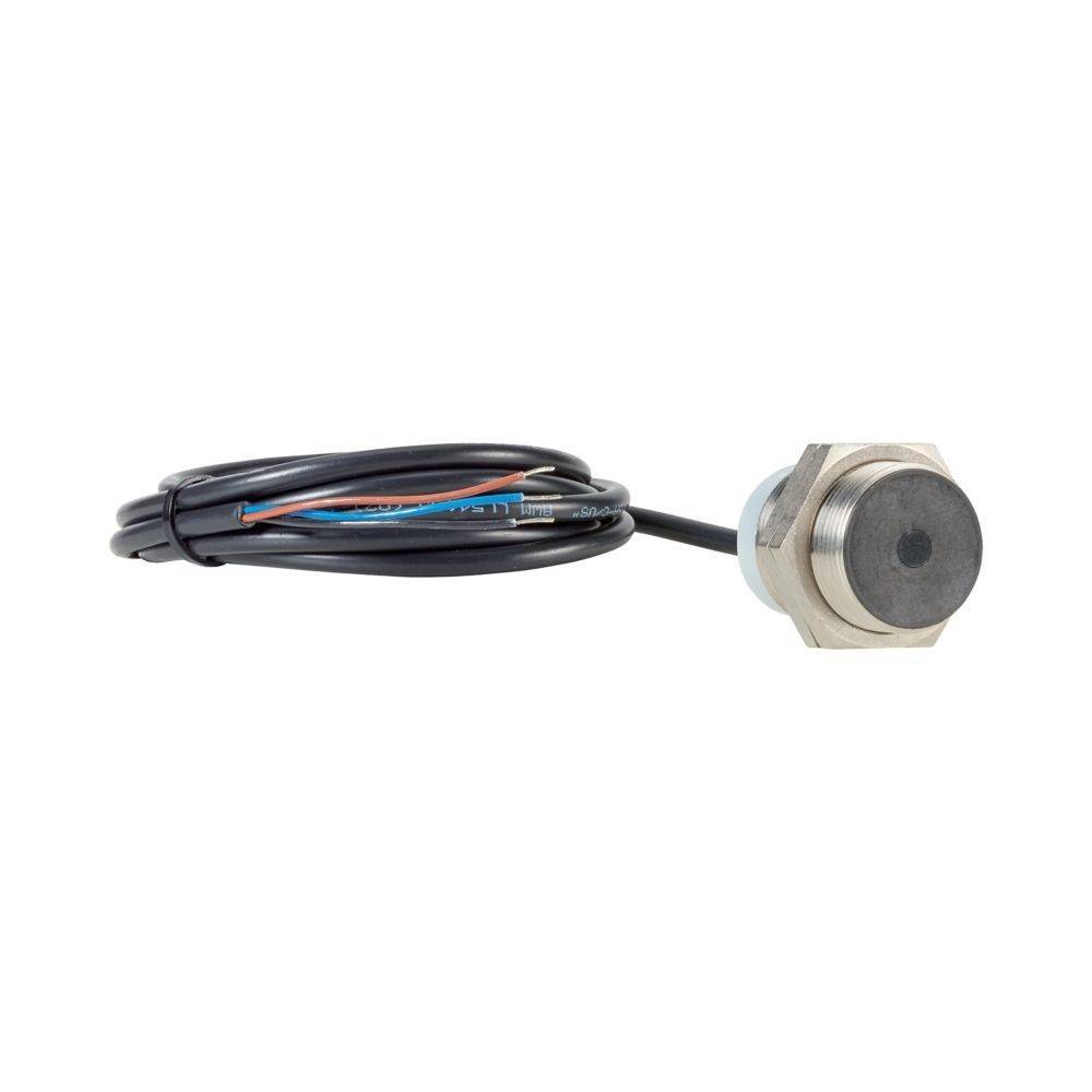 Ein metallischer, zylinderförmiger Sensor mit angeschlossenen schwarzen Kabeln, verwendet für industrielle oder mechanische Anwendungen.
