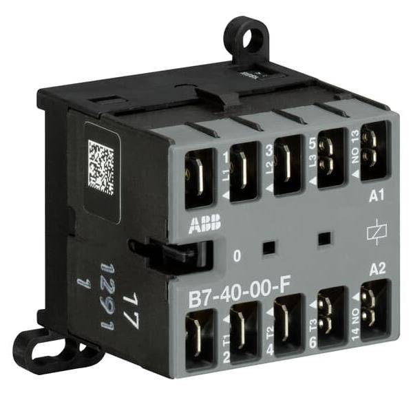 Industrielle elektrische Relaiskomponente mit mehreren Anschlussklemmen, mit der Bezeichnung 'B7-40-00-F', verwendet für Schaltkreise.