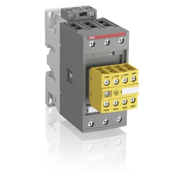 Elektrischer Schütz mit einem grauen Gehäuse und gelbem Anschlussmodul, ausgestattet mit mehreren Anschlusspunkten für elektrische Schaltkreise.